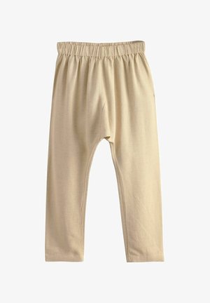 Beige babybyxor med elastisk midja, enkel design och raka ben, visade på vit bakgrund.