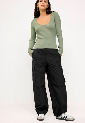 Next RIPS - Reisitaskuhousut - black