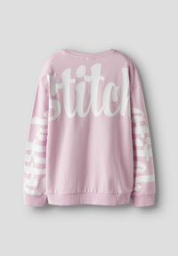 Felpa rosa con una grande scritta bianca "stitch" sul retro e lungo il maniche sinistro. Tessuto morbido con collo e polsini a costine.