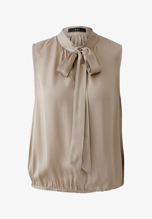 Ärmellose Bluse in Beige, aus glattem Stoff gefertigt. Verfügt über einen hohen Halsausschnitt mit einer Schnürung und einem elastischen Saum. Einfaches und elegantes Design.