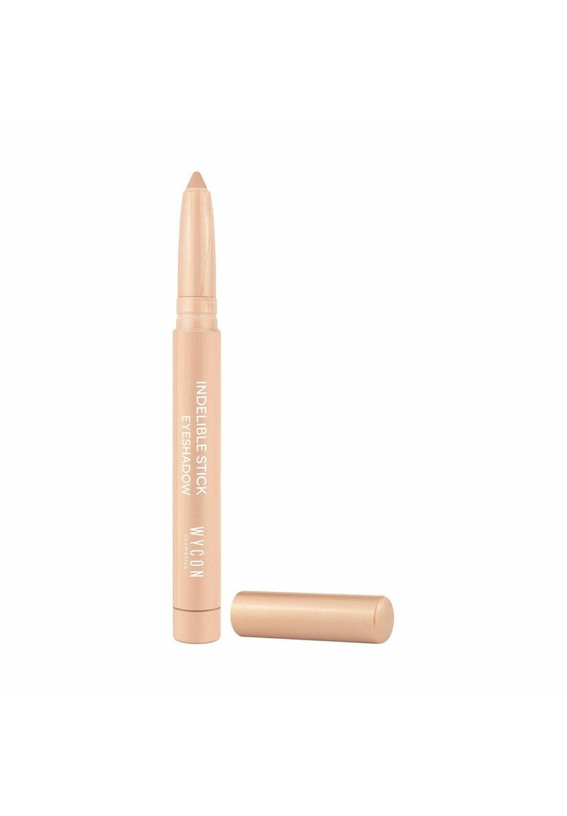 Ombretto in stick indelebile in una tonalità di rosa oro chiaro, caratterizzato da un design cilindrico elegante con una punta appuntita e un cappuccio removibile.