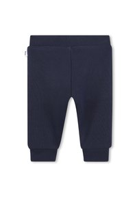 Navy blue cotton blend jogger pants with a ribbed texture, elastic waistband, and cuffs, featuring a label on the side.