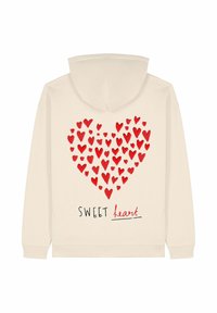 Felpa color crema con un grande design a forma di cuore rosso composto da cuori più piccoli. Sotto c'è la scritta "SWEET heart" stampata in nero.