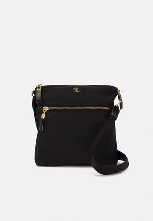 Borsa a tracolla nera compatta con tasca frontale con zip, finiture color oro e tracolla regolabile. Logo RL sopra la zip.
