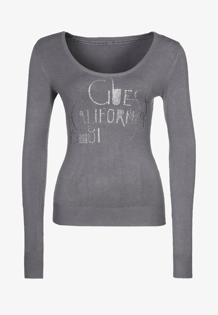 Grå långärmad topp med rundad halsringning och åtsittande design. Framsidan har silvertexten "Guess California 1981". Mjuk stickad material.