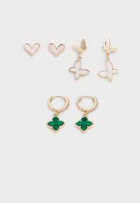 Gold-tone earrings set including two heart studs, butterfly drops, and green clover-shaped dangles with crystal accents on hoops.
