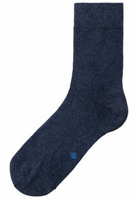 Navy blue sock made of a textured knit material, featuring a ribbed cuff and a small blue square accent near the toe.