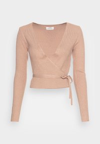 Ribbed, pink wrap top with long sleeves and a tie at the waist. V-neck design and smooth texture enhance the fitted silhouette.