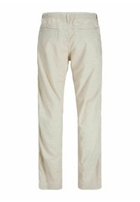 Béžové, lehké kalhoty z bavlněné směsi s elastickým pasem, rovnými nohavicemi a zadními kapsami. Texturovaný povrch s jemnými vzory.