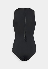 Black one-piece swimsuit made of smooth material, featuring a high neckline and a central zipper at the back. Side accents enhance design.