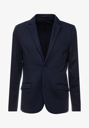 Navy blue blazer made of textured fabric, featuring a single button closure, notched lapels, and two front pockets.