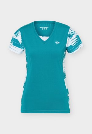 Teal V-neck short-sleeve sports shirt with white and teal geometric patterns on sleeves and sides, Dunlop logo on chest and inside collar.