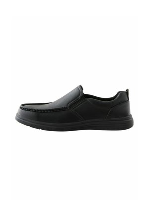Black slip-on shoe with a smooth leather upper, textured stitching along the toe, and a flexible rubber sole. Minimalist design.