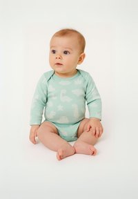 Bodysuit dugih rukava u mint zelenoj boji s uzorcima dinosaura u svjetlijim nijansama, od mekog materijala, s gumbima na dnu.