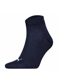 Navy ankle socks made of a smooth material with a ribbed cuff and a white logo accent on the toe. Lightweight and breathable design.