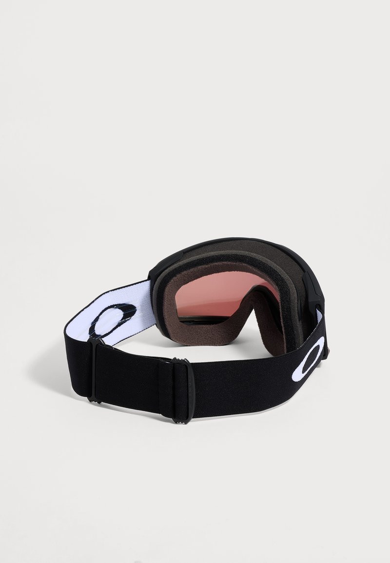 Black ski goggles with pink-tinted lenses, foam padding, and an adjustable black strap featuring a white oval logo.