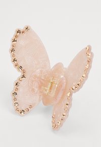 Rosa, schmetterlingsförmige Haarspange aus Kunststoff, mit einer strukturierten Oberfläche und verziert mit roségoldenen Kristallen entlang der Kanten.