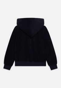 Moleton preto com capuz e mangas longas, com punhos e bainha canelados, exibido de costas sobre um fundo branco.