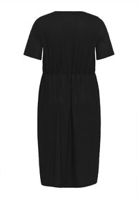 Black knee-length dress made from soft fabric, featuring short sleeves, a round neckline, and an elastic waist for a relaxed fit.
