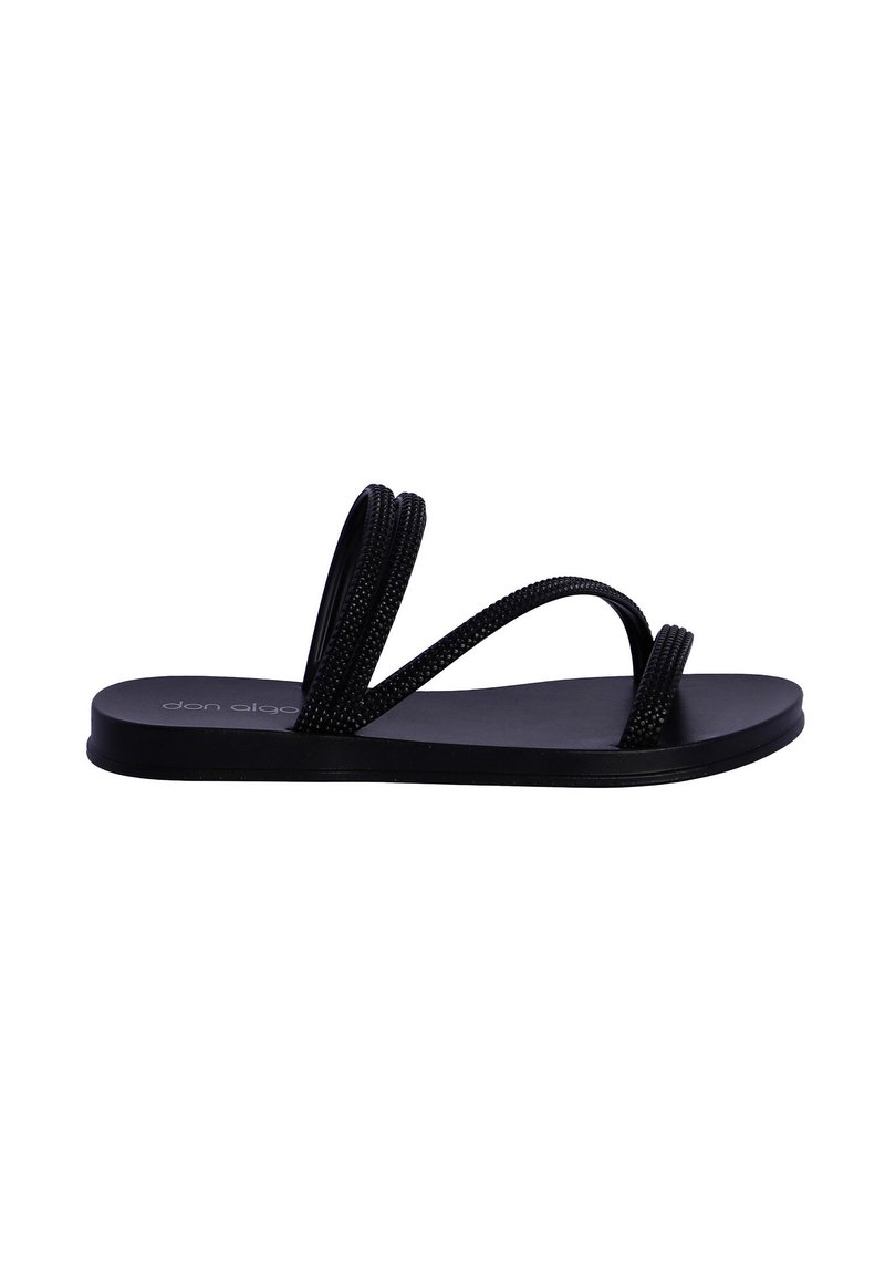 Chancla negra con dos correas trenzadas y suela plana. Hecha de goma, presenta una textura mate suave y un diseño minimalista.