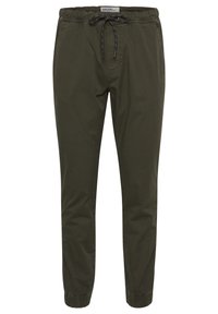 Oliivivihreät slim-fit haalarihousut, jotka on valmistettu kevyestä kankaasta. Niissä on joustava vyötärönyöri, sivutaskut ja joustavat hihnat.