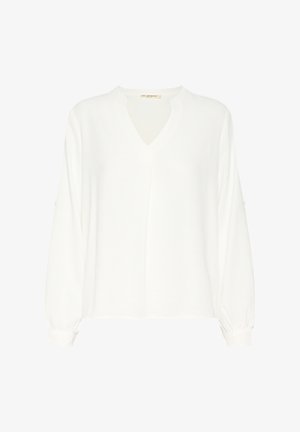 Witte langwerpige blouse met lange mouwen en V-hals, met geplooide mouwen en zachte textuur. Heeft een ontspannen pasvorm en subtiele stiksels bij de halslijn.