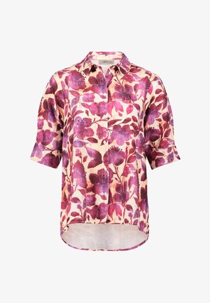 Kurzärmelige Bluse mit Blumenmuster in Creme, gekennzeichnet durch große lila und rosa Blumen, Knopfleiste vorne und einen gebogenen Saum mit lockerer Passform.