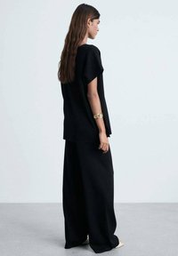 Mango ANNE-A - Pantaloni - black