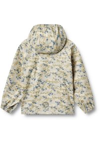 Blommönstrad jacka med en ljusbeige bakgrund, elastisk huva och ärmslut. Har blå och gula blommor, samt en logodetalj på fållen.
