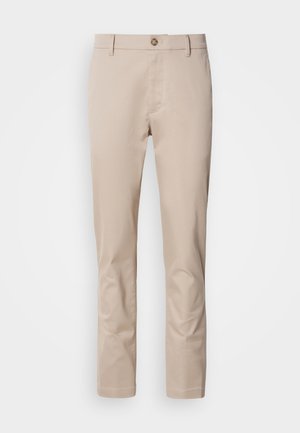 Beige katoenen chino's met een rechte pasvorm, riemlussen, een enkele voorknoop en een gladde, niet-gestructureerde oppervlakte. Er zijn geen zichtbare zakken.