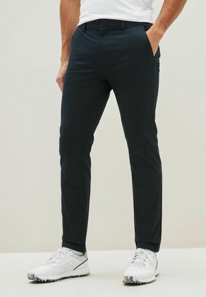 SLIM FIT SHOWER RESISTANT - Vászonnadrágok - navy blue