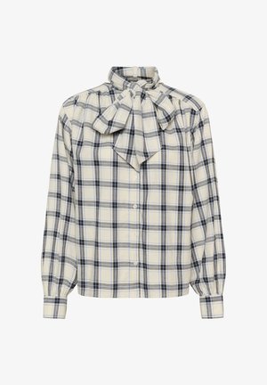 Pledinė palaidinė kremo, mėlynos ir pilkos spalvų. Su susirišama lankeliu apykaklėje, sagomis priekyje ir ilgomis rankovėmis su prigludusiomis rankogaliais. Audinio pynimo tekstūra.