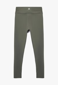 Olivgröna leggings tillverkade av ett mjukt, stretcht tyg. Hög midja, kroppsnära design och inga synliga sömmar.