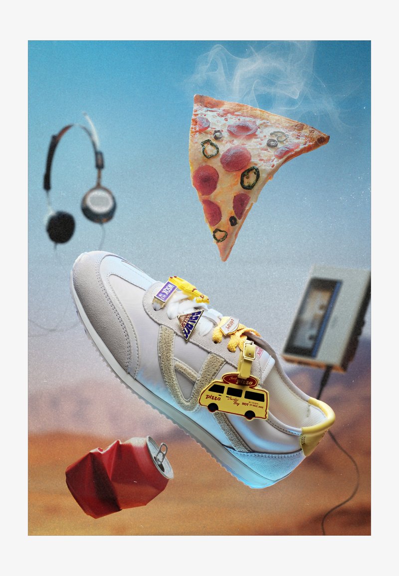 White sneaker with pizza-themed pins floating among a steaming pizza slice, crushed soda can, headphones, and cassette player.