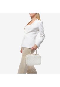 Miriade SOLANA - Borsa a mano - off white