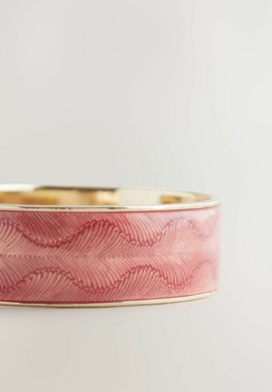 Pink bangle featuring a wavy pattern and gold-tone edge, crafted from smooth material with a glossy finish.