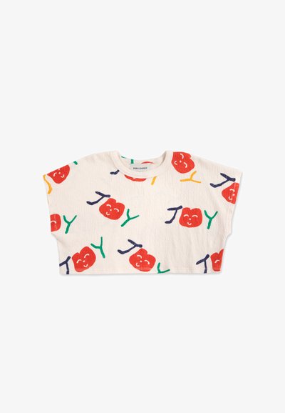 Cotton crop top with short, wide sleeves. Features a cream base and colorful prints of red apples with faces, green stems, and playful text.