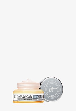 Kleine open pot met bleekgele oogcrème met een zilveren deksel ernaast, met het label "Ontwikkeld met plastisch chirurgen en dermatologen."