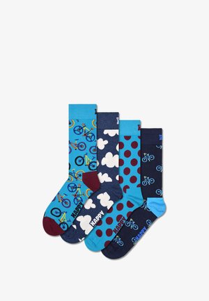 Čtyři páry bavlněných ponožek: jasně modré s potiskem kol, tmavě modré s mraky, tmavě modré s puntíky a tmavě modré s obrysy kol.