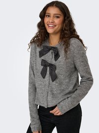 Gray knitted cardigan with a cropped design, featuring two black bow accents on the front. Textured fabric and long sleeves.