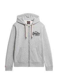 Sudadera de cremallera gris claro con un bolsillo frontal, capucha con cordones y marca bordada. Tejido suave con puños y dobladillo acanalados.