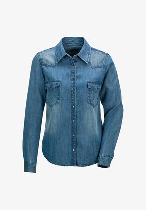 Denim button-up shirt in medium blue with long sleeves, structured yoke, two chest pockets, and metal snap closures. Textured fabric.