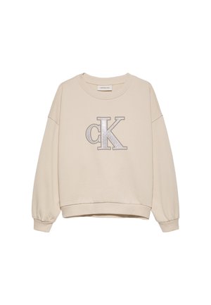 Beige Sweatshirt mit einem silbernen Glitzer-"cK"-Logo. Es hat lange Ärmel, einen runden Ausschnitt und gerippte Bündchen sowie einen gerippten Saum. Aus weichem Baumwollstoff.