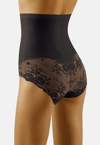 Hoge taille vormende slip in zwart met een glad, ondoorzichtig materiaal en een doorzichtige kantpaneel met bloemenpatronen aan de achterkant.