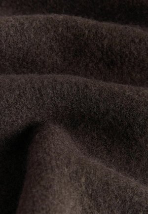 Dark brown fabric with a soft, fuzzy texture, displaying subtle variations in shade and depth, indicative of wool or similar material.