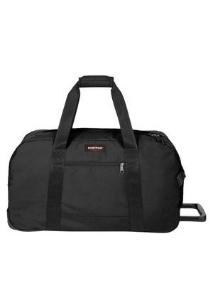 Black duffel bag made of durable fabric, featuring two sturdy top handles, a zippered front pocket, and a wheeled base for easy transport.
