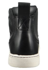 Black leather high-top sneaker with a textured white rubber sole, stitched detailing, and a back pull tab for easy wear.