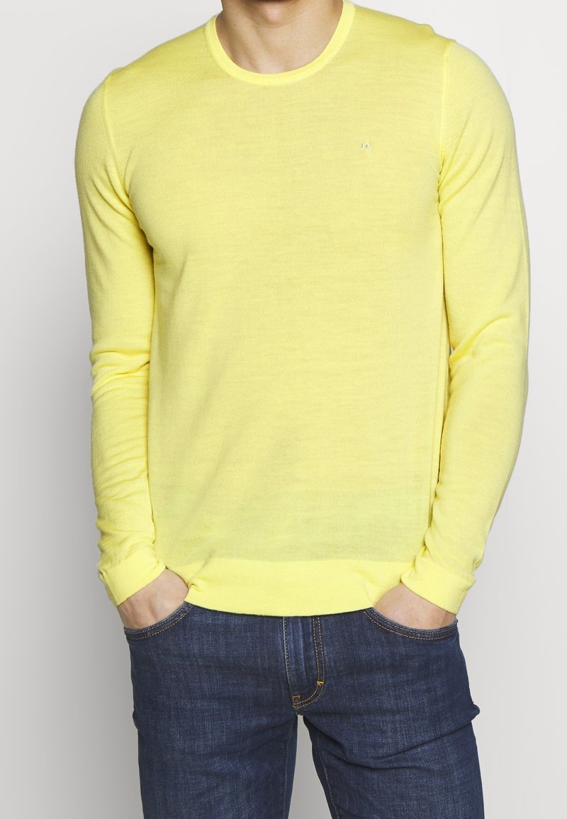 J.LINDEBERG Stickad tröja - yellow