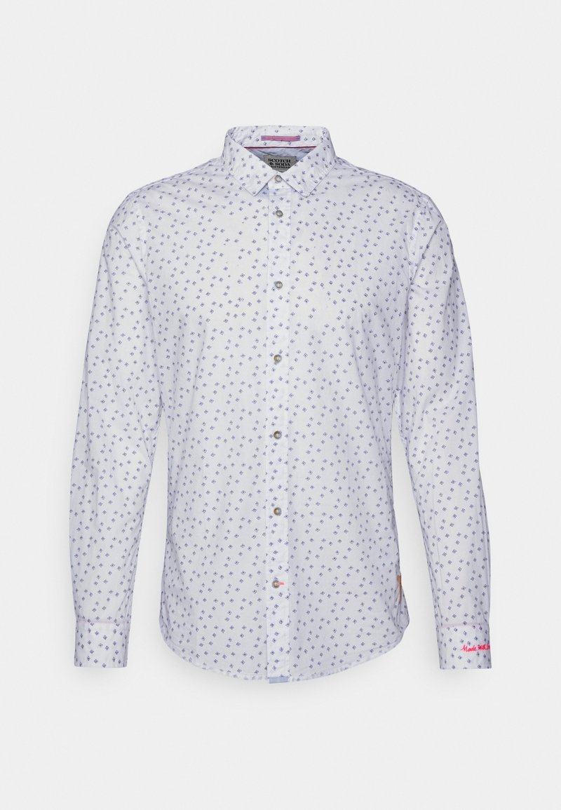 Biała koszula z długim rękawem w drobny niebieski kwiatowy wzór, z kołnierzykiem na guziki, zapięciem na guziki z przodu oraz małym logo na mankiecie.