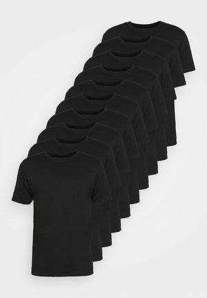 Black cotton t-shirts stacked in rows, each with a crew neckline and short sleeves, displaying a smooth texture and simple design.